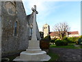 Looking from a war memorial in Ocklynge Cemetery towards St Michael