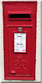 King George VI postbox in a Pontnewynydd wall