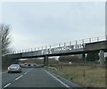 M58 Railway Bridge Graffiti: "Pies Financial Reset"