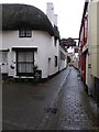 Beach Street, Dawlish with sign for the Railway Inn