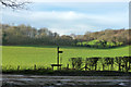 Footpath sign and stile