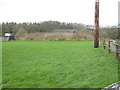 Field by Marles Lane bridleway with shed on the slant