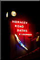 TQ3086 : Neon sign, Hornsey Road by Jim Osley
