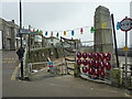 War memorial and harbour wall in Mousehole