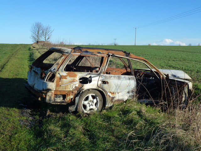 Torched car on Parson's Drove near Stretham, Cambridgeshire
