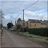 TL4970 : Chittering: School Lane and The Old School House by John Sutton