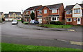 Arrowsmith Drive houses opposite a playground, Stonehouse 