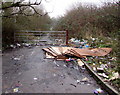 Rubbish and gate across Seven Stiles Avenue, Newport