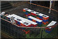 View of milk crates being used as tables in the Cereal Killer Cafe