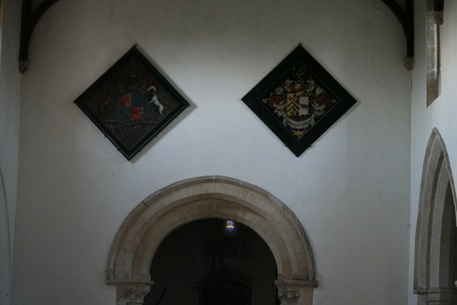 St Andrew's church: Hatchments and Norman Arch