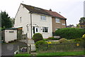 Semi-detached houses at Kirkstall Drive / Fenton Avenue junction