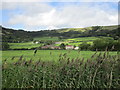 Bourton Combe from the banks of the River Yeo