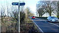 Footpath sign by the A436