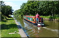 Narrowboat heading along the Trent & Mersey Canal