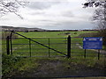 Gate to Royal Eastbourne Golf Course and footpath at Gaudick Road