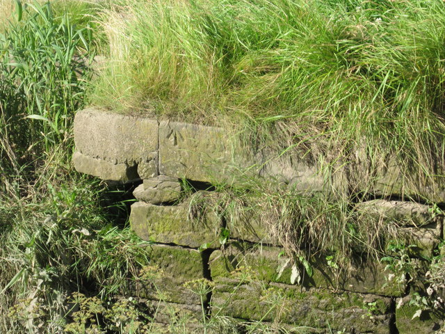 Saltney quay wall and a rivet bench mark