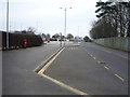 Road and bus stop outside South Cliff Caravan Park