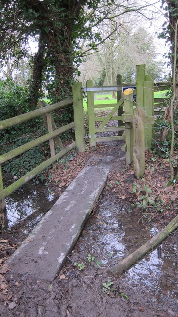 Walking the plank-a rather slippery plank bridge adjacent to Northwick churchyard