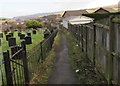 Path descending past the southern edge of a churchyard, Brynmawr