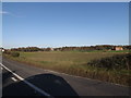 TM3862 : Farmland looking towards John the Baptist Church by Geographer