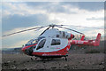 SP9512 : Air Ambulance in field by Tring Station by Chris Reynolds