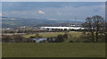 Hapton Reservoir separated from local industry by the M65