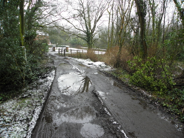 Muddy lane with potholes, Mountjoy... © Kenneth Allen cc-by-sa/2.0 ...