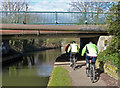 Cyclists passing under Stanton Gate Bridge No 13