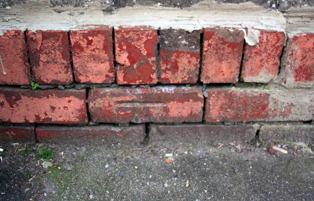Benchmark on wall fronting #580 Filton Avenue