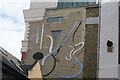View of guitar wall art on the rear of Victoria Mills on Boyd Street from Fairclough Street