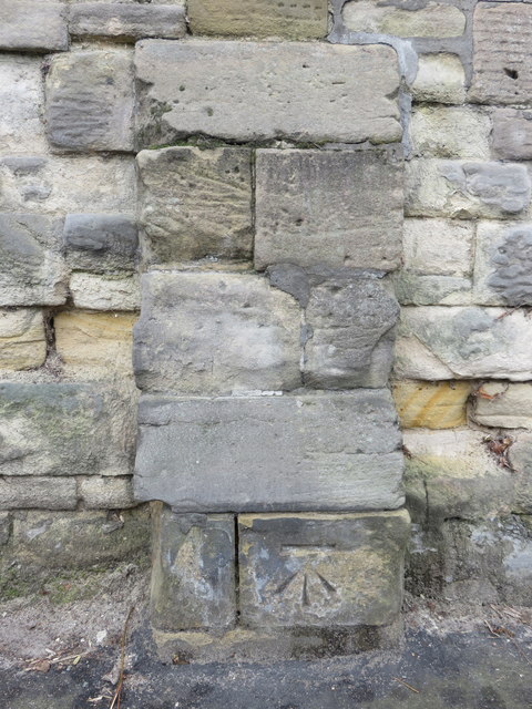Bench mark on wall buttress in Highfield South