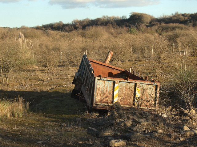 Large metal object on waste ground near South Cornelly