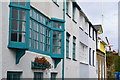 Coloured window frames at Salcombe