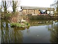 Dutch barn and village pond