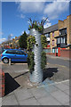 TQ2986 : Giant planter, Junction Road by Jim Osley