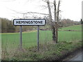 TM1353 : Hemingstone Village Name sign on Sandy Lane by Geographer