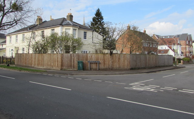 Wooden fence and telecoms box on a Cheltenham corner
