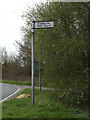 TM0857 : Roadsign on Mill Lane by Geographer