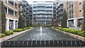 New apartments and courtyard with fountain by Kew Bridge