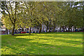 Evening sunshine lights open space by Kitson Road and Rust Square, Camberwell