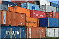 Piled containers on Ferry Lane