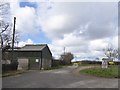 Farm building at The Beeches and road to Hollacombe