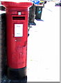 King George V pillarbox outside Nash Stores, Newport