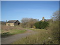 Disused Engine Shed and Former Station Masters House (left)