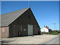TG0527 : Large barn beside Hindolveston Road by Evelyn Simak