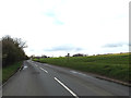 TM1154 : B1078 Needham Road & footpath by Geographer