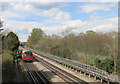 Train passing Hendon Park