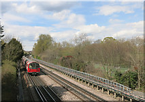TQ2388 : Train passing Hendon Park by Des Blenkinsopp
