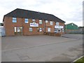 Semi-detached business premises by the A264