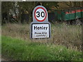 Henley Village Name sign on Main Road